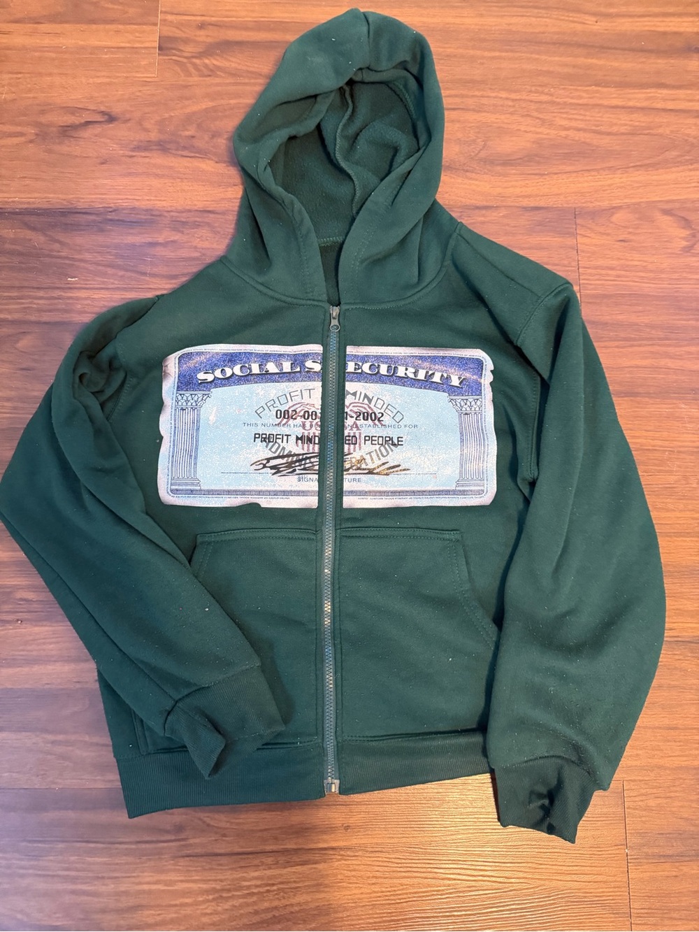 Dark Green Zip-Up Hoodie with Graphic Patch